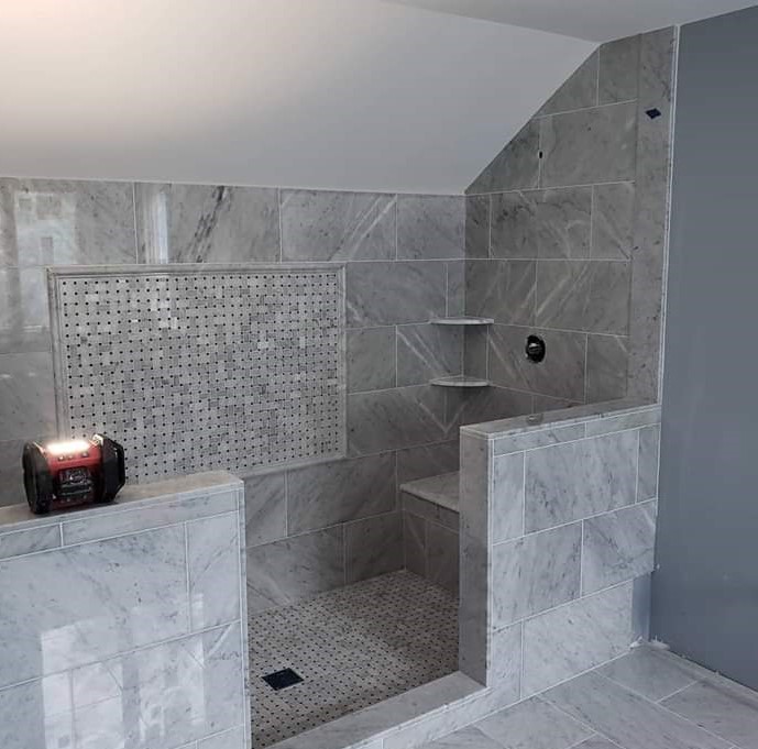marble shower with inset